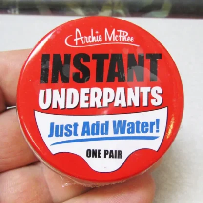 New UH OH... Instant Underpants in Tin - Just add water! Gag Joke ~ Archie McPhee - Miniature Marvels: Airplane Models & Painted Dice Egpull